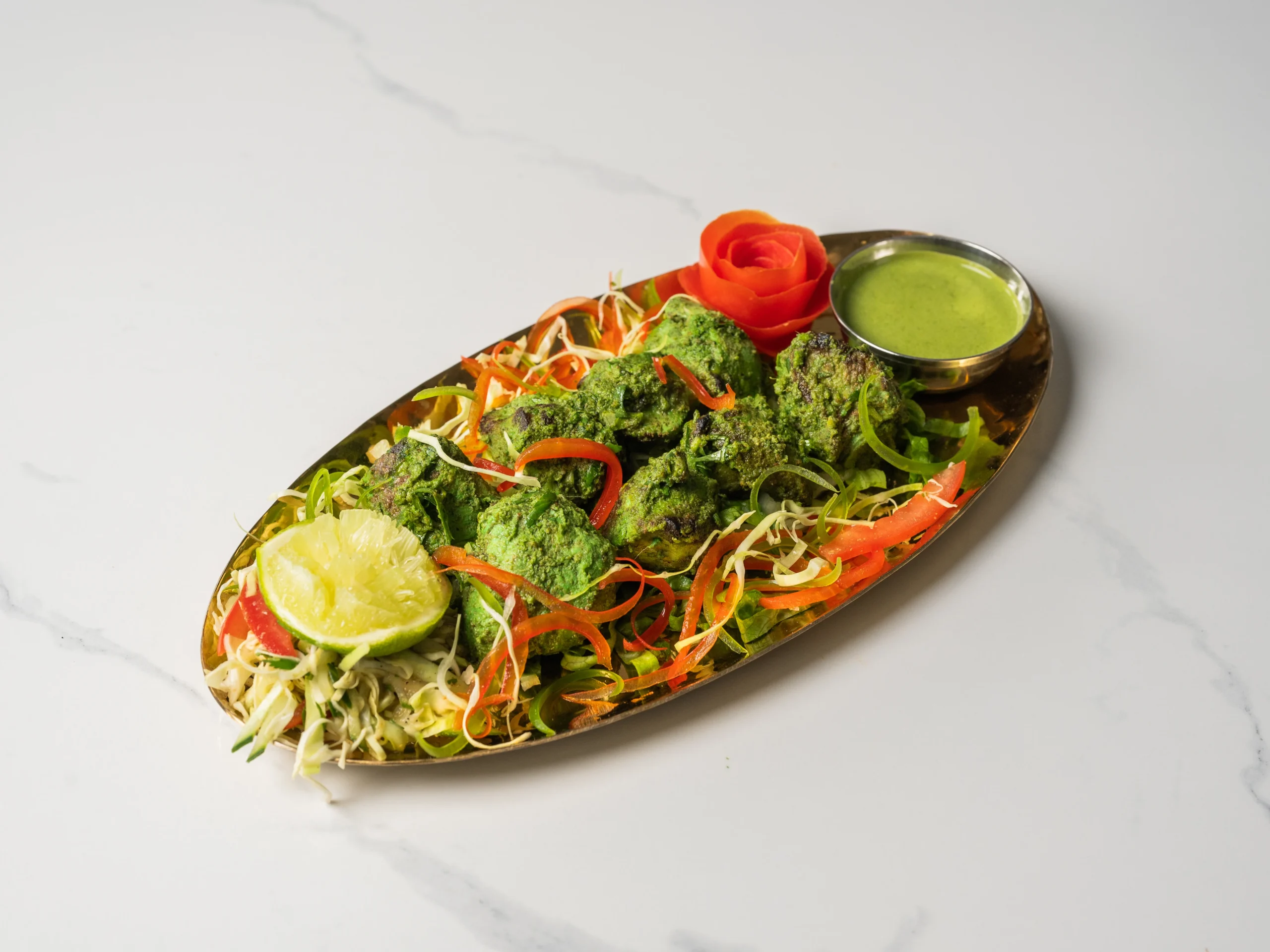 CHICKEN HARIYALI TIKKA green herb marinated tandoori chicken with spinach mint coriander in Den Haag CHICKEN HARIYALI TIKKA green herb marinated tandoori chicken with spinach mint coriander in Den Haag