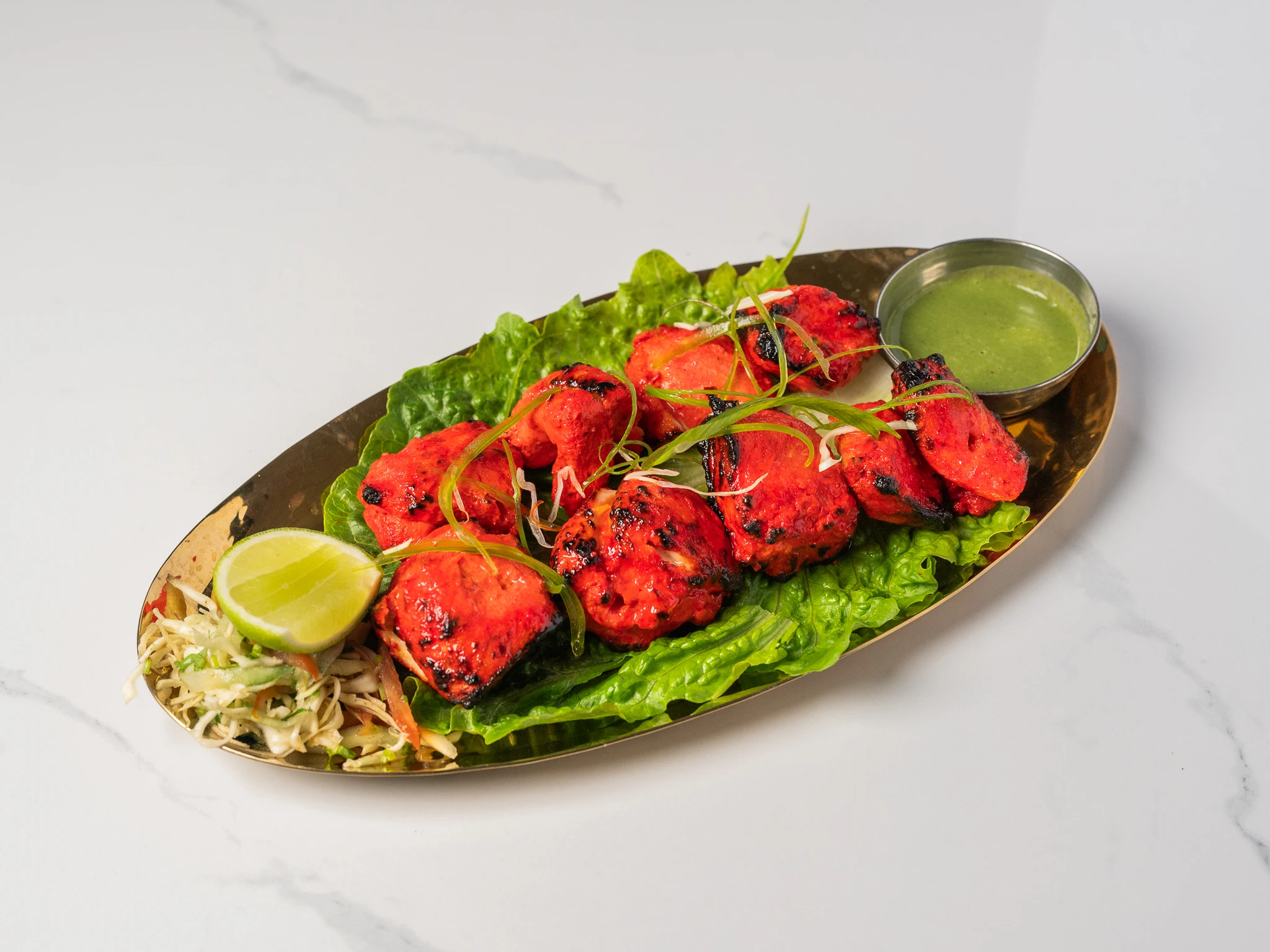 CHICKEN TIKKA boneless Indian tandoori grilled chicken pieces in Den Haag CHICKEN TIKKA boneless Indian tandoori grilled chicken pieces in Den Haag