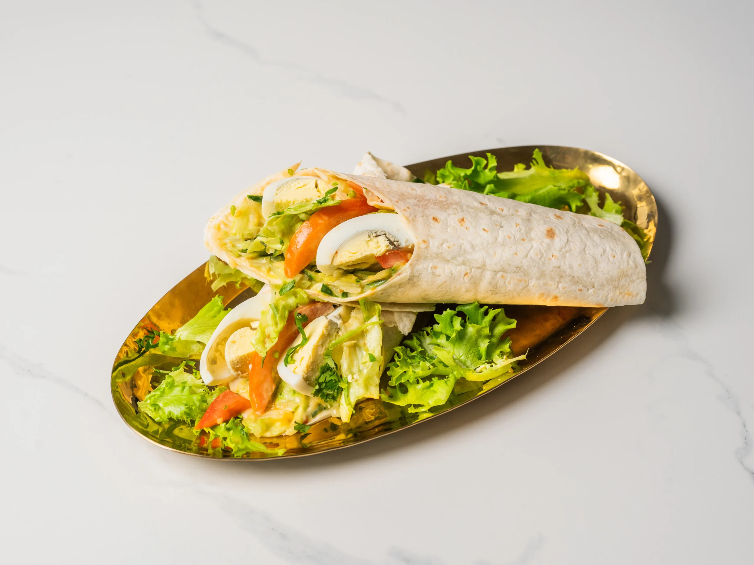 egg kathi roll indian egg wrap with omelette herbs and salad den haag egg kathi roll indian egg wrap with omelette herbs and salad den haag