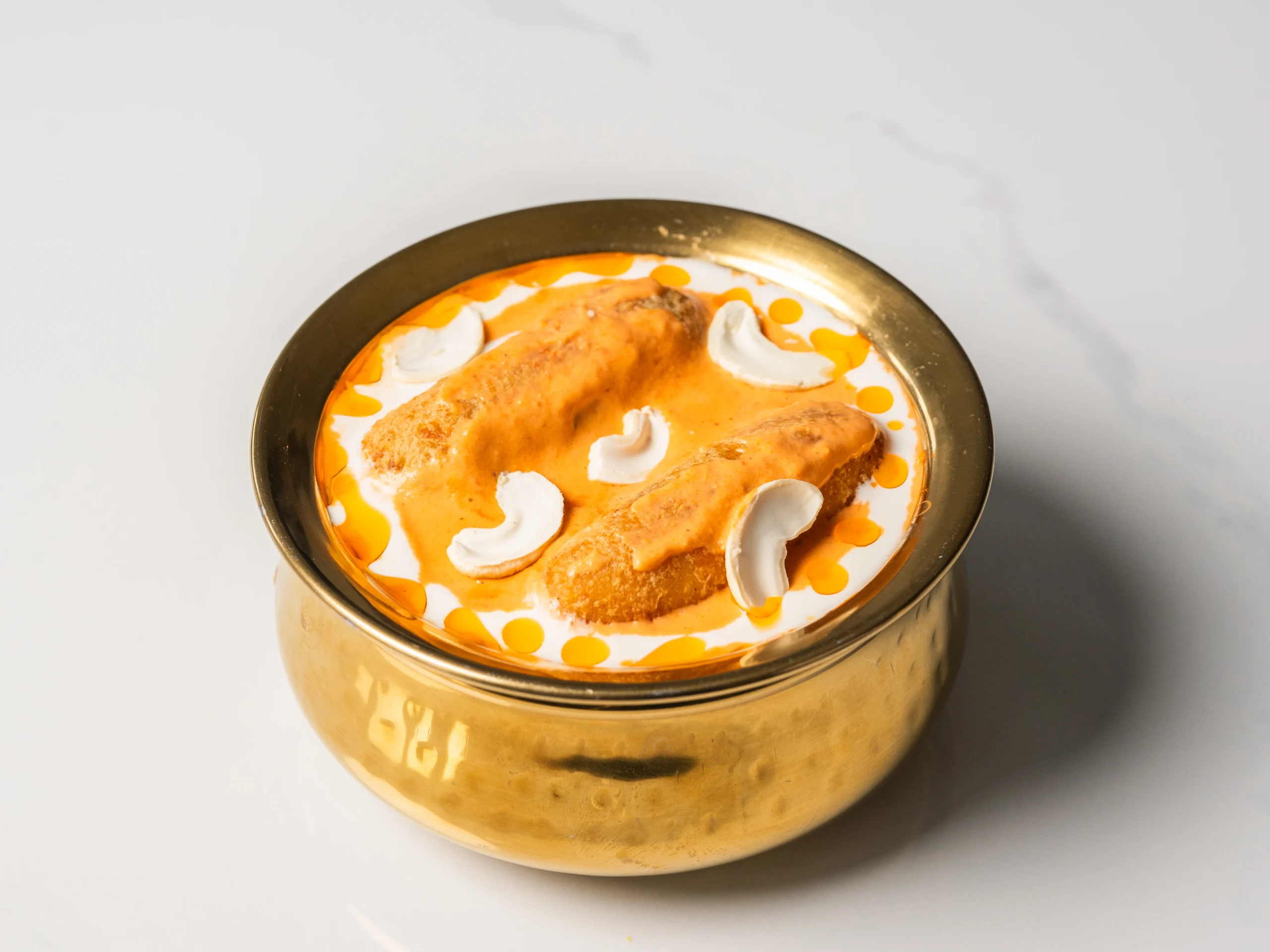 MALAI KOFTA creamy cashew gravy with vegetable dumplings Indian vegetarian curry served with naan in Den Haag MALAI KOFTA creamy cashew gravy with vegetable dumplings Indian vegetarian curry served with naan in Den Haag