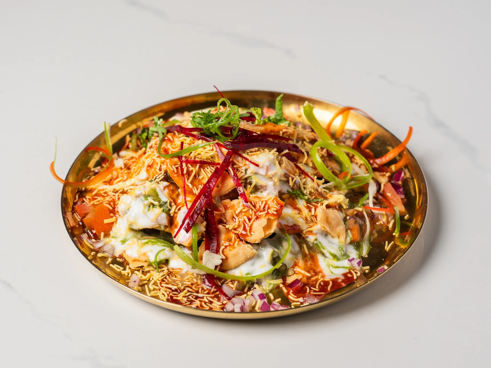 Papdi chaat with crispy wafers yogurt mint chutney Indian street food in Den Haag Papdi chaat with crispy wafers yogurt mint chutney Indian street food in Den Haag