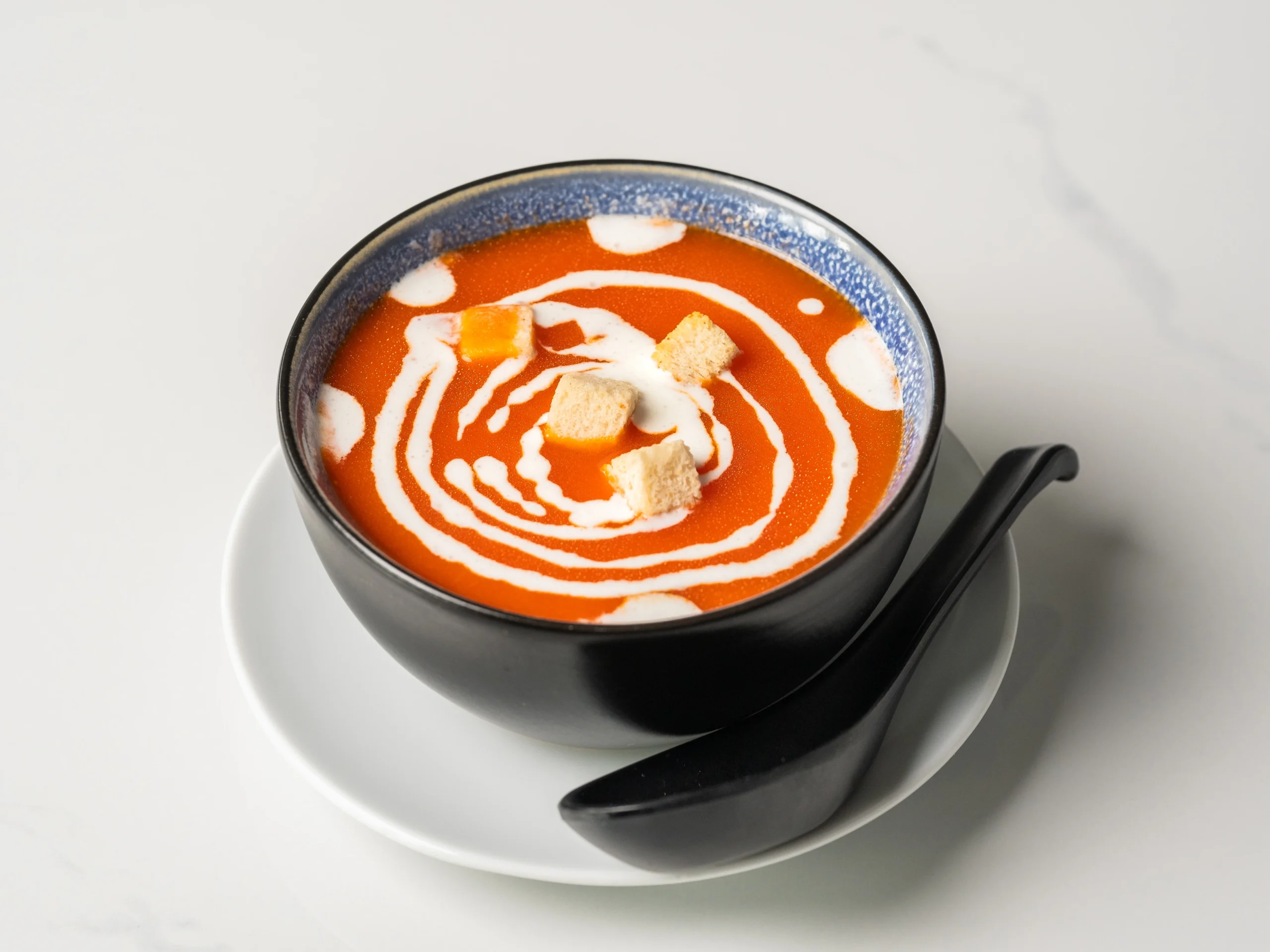 TOMATO SOUP creamy Indian tomato soup with mild spices at Chopras Indian Restaurant Den Haag TOMATO SOUP creamy Indian tomato soup with mild spices at Chopras Indian Restaurant Den Haag