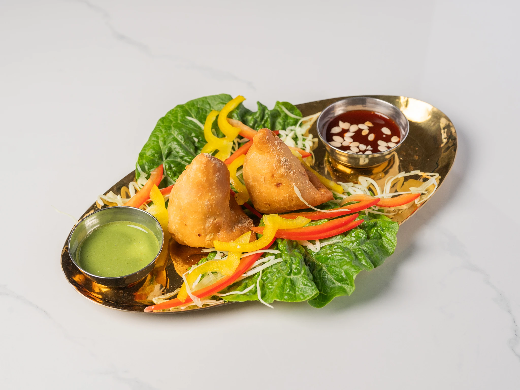 Indian vegetable samosa crispy fried starter in Den Haag at Chopras Indian Restaurant Indian vegetable samosa crispy fried starter in Den Haag at Chopras Indian Restaurant